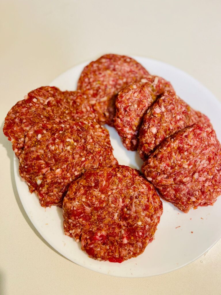 prepped hamburger patties ready for the grill