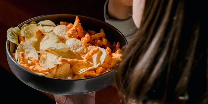 Woman tackling late-night snacking